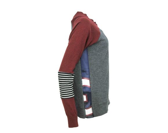 Maroon sleeve, zebra striped elbow soft raglan sweater with mesh side panels. Size large.