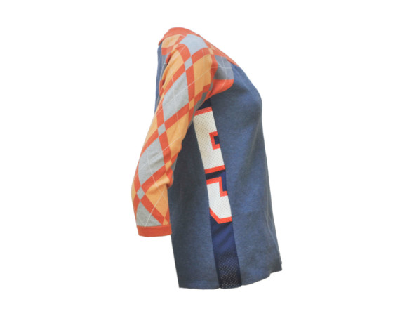 (SOLD) Orange and blue 3/4 sleeve argyle soft raglan sweater with mesh side panels. Size small.