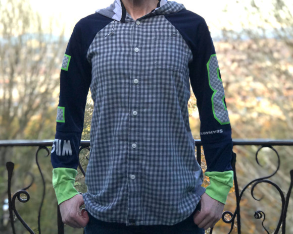 (SOLD) Blue, green and gray plaid raglan hoodie with Seahawks jersey sleeves. Size medium.