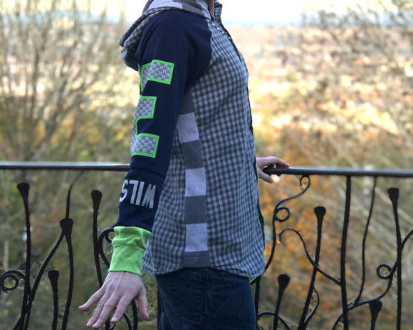 (SOLD) Blue, green and gray plaid raglan hoodie with Seahawks jersey sleeves. Size medium.
